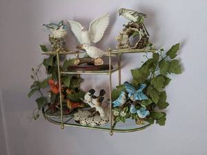 Wall display with glass shelves and...