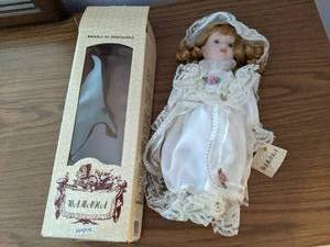Wamana porcelain doll (see photos )...