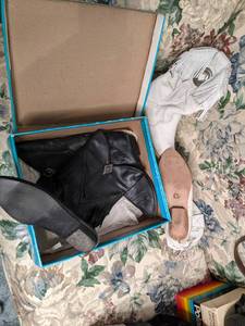 Well loved white and black leather ...