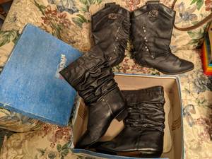 2 pairs well loved black leather bo...