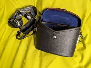 Sears Discoverer binoculars in case...