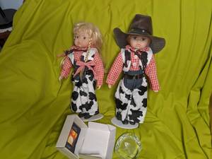 Porcelain cowboy and cowgirl figuri...