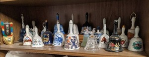 Large bell collection includes porc...