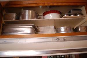 Cabinet of Bakeware (Cake PansLids...