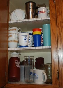 Cabinet of Coffee Cups, Tupperware ...