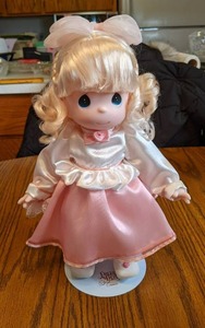 12 2001 Precious Moments doll on s...