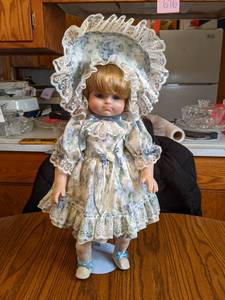 22 to top of Bonnet Porcelain Doll...