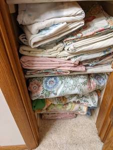 2 shelves of bedding (see photos )...