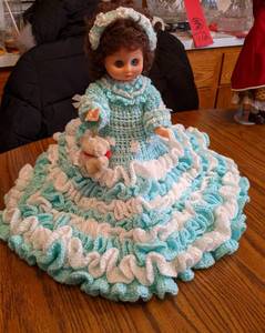 Plastic doll in a beautiful hand cr...