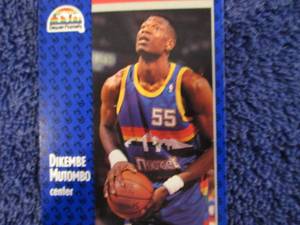17. 50 Dikembe Mutombo Cards...