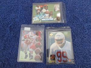 136. 3 Warren Sapp Rookie Cards...