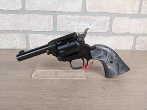 lot 107 image: NEW Heritage Barkeep Single Action .22LR Revolver with Gray Pearl Handle
