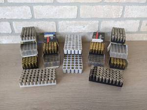 lot 271 image: 450 Rounds of 9mm Brass Casings and 250 9mm Nickle Casings from St. James Gun Club Firing Range