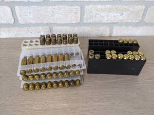 lot 266 image: 65 Rounds of Misc. Brass Casings from St. James Gun Club Firing Range