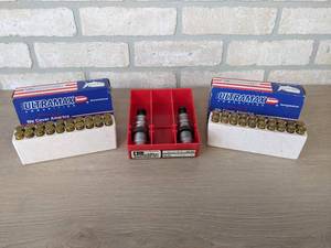 lot 283 image: 100 Rounds of .40 Brass Casings and (2) 30-30 Reloading Dies