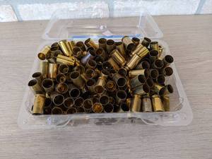 lot 280 image: 250 Rounds of 45 ACP Brass Casings from St. James Gun Club Firing Range