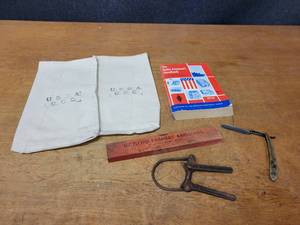 lot 101 image: Vintage Advertising, George Wosterholm Antique Razor, Radio Amateurs Handbook, Antique Jar Sealer and USDA Canvas Bags