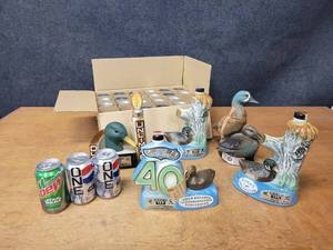 lot 128 image: Lot of Ducks Unlimited Decanters and (24) Collectable Pepsi  Mountain Dew Soda Cans - NO SHIPPING