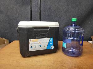 lot 138 image: Nice Rolling Coleman 50qt Cooler and 5 Gallon Water Jug - NO SHIPPING