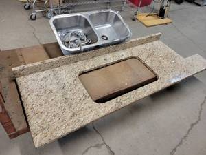 lot 164 image: Section of Granite Countertop w Undermount Stainless Steel Sink - Overall the countertop is about 76 long overall x 25-12 deep x 1-14 thick - Chunk out of corner measures 9-12 x 17 - NO SHIPPING