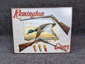 lot 57 image: Remington Guns Tin Sign