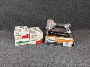 lot 150 image: Lot of Angled Chisel Point Finishing NailsBrads and Angled Framing Nails with Senco Pneumatic Nailer