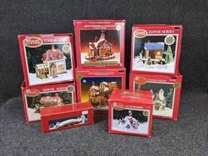 lot 176 image: Lot of 8 Dickens Collectables and Santas Workbench Christmas Village Buildings