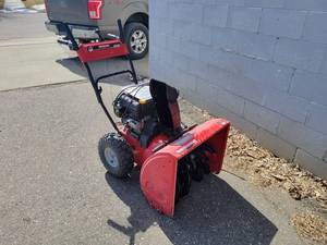 lot 2 image: Yard Machines 24 179cc Snow Blower, Electric Start - Runs and Works very good