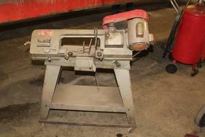 lot 13 image: Fisher Machinery Band Saw  with Rolling Stand