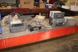 lot 222 image: Car Audio  with GM Delphi TunerCD Player, VW Amp, Panasonic 8-Disc Changer, 6-Disc Changer, Wiring