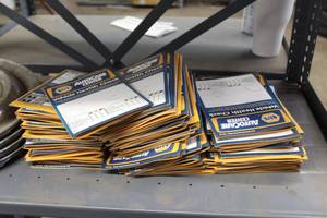 lot 167 image: Lot of NAPA AutoCare Center Vehicle Health Check Packets