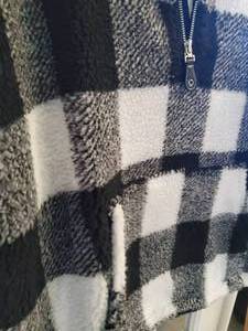 BLACK AND WHITE PLAID PULLOVER WITH ZIPPER