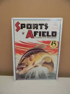 lot 45 image: VINTAGE SPORTS AFIELD FISHING TIN SIGN - JULY 1934 HUNTING-FISHING-BOATING-CAMPING-TRAPSHOOTING-SKEET - NICE - APPROX 12 By 16 - SEE PICTURES