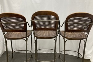 lot 5 image: Three Vintage Iron Barstools with Cane Seats