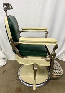 lot 71 image: Antique Forest Green & Cream Cast Iron Barbers Chair by Emil J. Pair Company Chicago