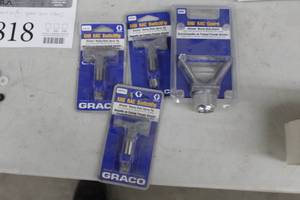 lot 818 image: Lot of (4) Spray Gun Parts - XHD RAD Guard Heavy Duty Guard (x1), XHD RCA SwitTip Heavy Duty Spray Tip (x3)