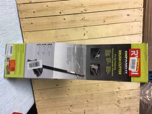lot 6 image: RYOBI Expand-It 8 in. Brush-Cutter Trimmer Attachment Customer Returns See Pictures