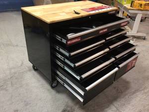 lot 108 image: 46 in. W x 24 in. D 9-Drawer Gloss Black Deep Tool Chest Mobile Workbench with Hardwood Top by Husky Customer Returns See Pictures