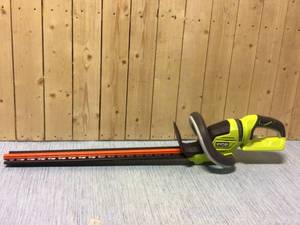 lot 54 image: RYOBI 40V 24 in. Cordless Battery Hedge Trimmer with 2.0 Ah Battery and Charger Customer Returns See Pictures