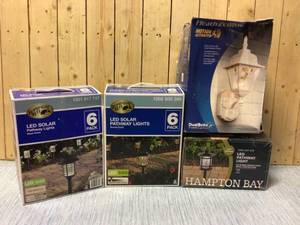 lot 77 image: Hampton Bay Solar Bronze Outdoor Integrated LED 3000K 6-Lumens Landscape Pathway Light (6-Pack) Customer Returns See Pictures