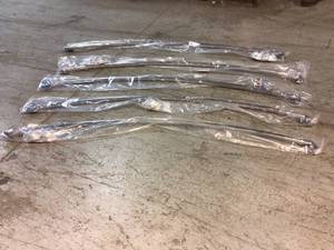 lot 80 image: MOEN 60 in. Curved Shower Rod with Pivoting Flanges in Brushed Nickel Customer Returns See Pictures