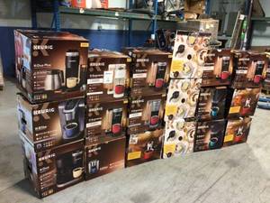 lot 100 image: HUGE MIX LOT OF KEURIC COFFE MAKER Customer Returns See Pictures