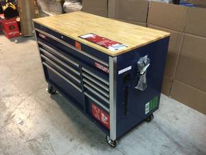 lot 105 image: 52 in. W x 24.5 in. D 10-Drawer Blue Mobile Workbench with Solid Wood Top by Husky No Keys Customer Returns See Pictures