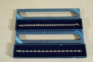 lot 41 image: 2 Silver Tone Bracelets