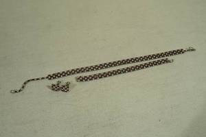 lot 34 image: Red and Clear Stone Bracelet, Necklace, and Earrings