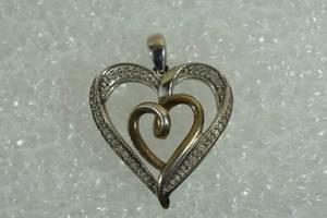 lot 15 image: Sterling Silver Heart Pendant