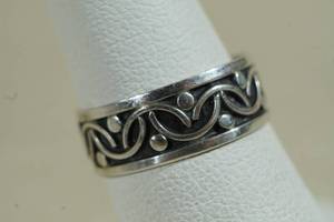 lot 20 image: Sterling Silver Wide Band Carved Ring