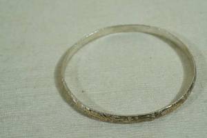 lot 24 image: Sterling Silver Bangle Bracelet - Carved Design