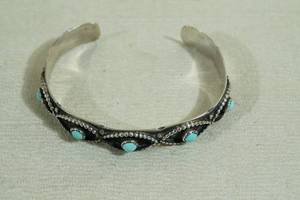 lot 26 image: Artisan Sterling Silver and Turquoise Cuff Bracelet - James Smith