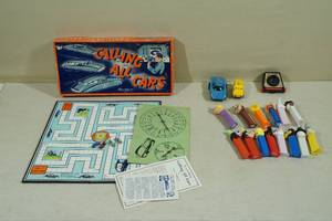 lot 93 image: Vintage Toys - Dick Tracy Wrist Radio, Calling All Cars Game, Pez